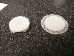 The button , and printed support material