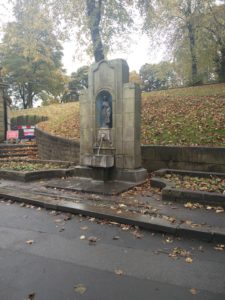 St Ann's Well, Buxton. A well showing water pouring from it