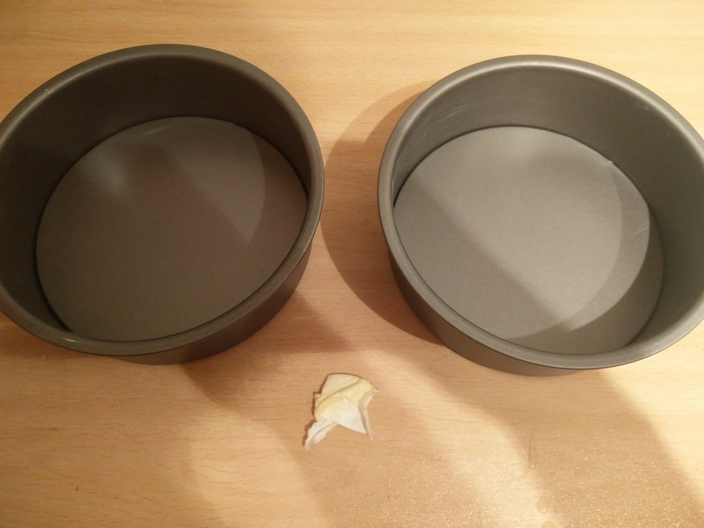 The cake tins after being greased