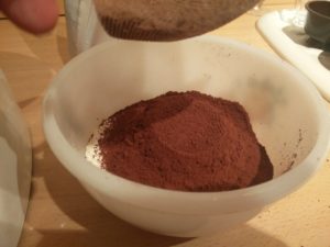 The cocoa powder being sifted