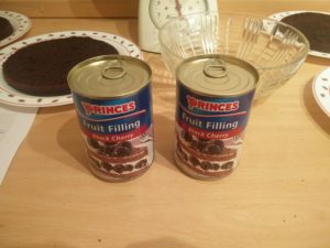 Two cans of cherries