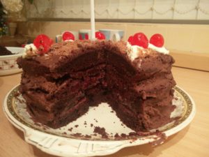 The full Portal Cake with the slice missing from it