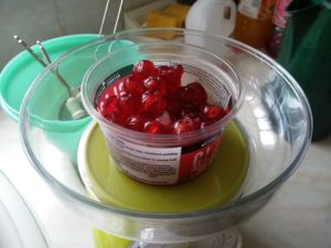 The cherries being weighed in their packaging