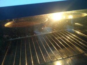 The cake tins in the oven