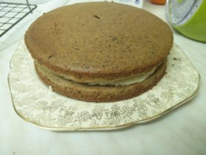 The two cake halves have been sandwiched together