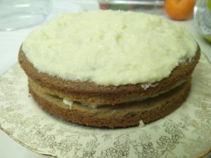 The completed cake, with icing speed over the top