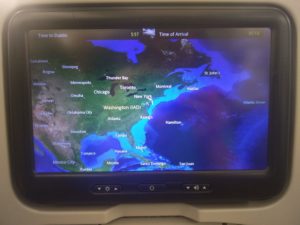 The screen showing a word map and the plane slowly moving away from Washington