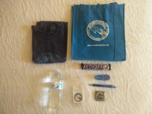 The t-shirt, tote bag and items contained within it