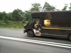 A UPS van with the door open