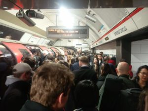 A crowded platform at Oxford Circus underground station